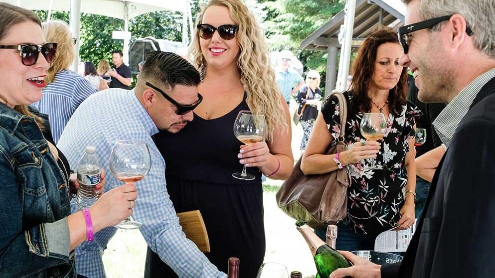 People drinking wine at Pinot Fest